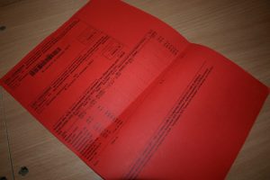 В Саратове должники за ЖКУ получат ярко-красные платежки